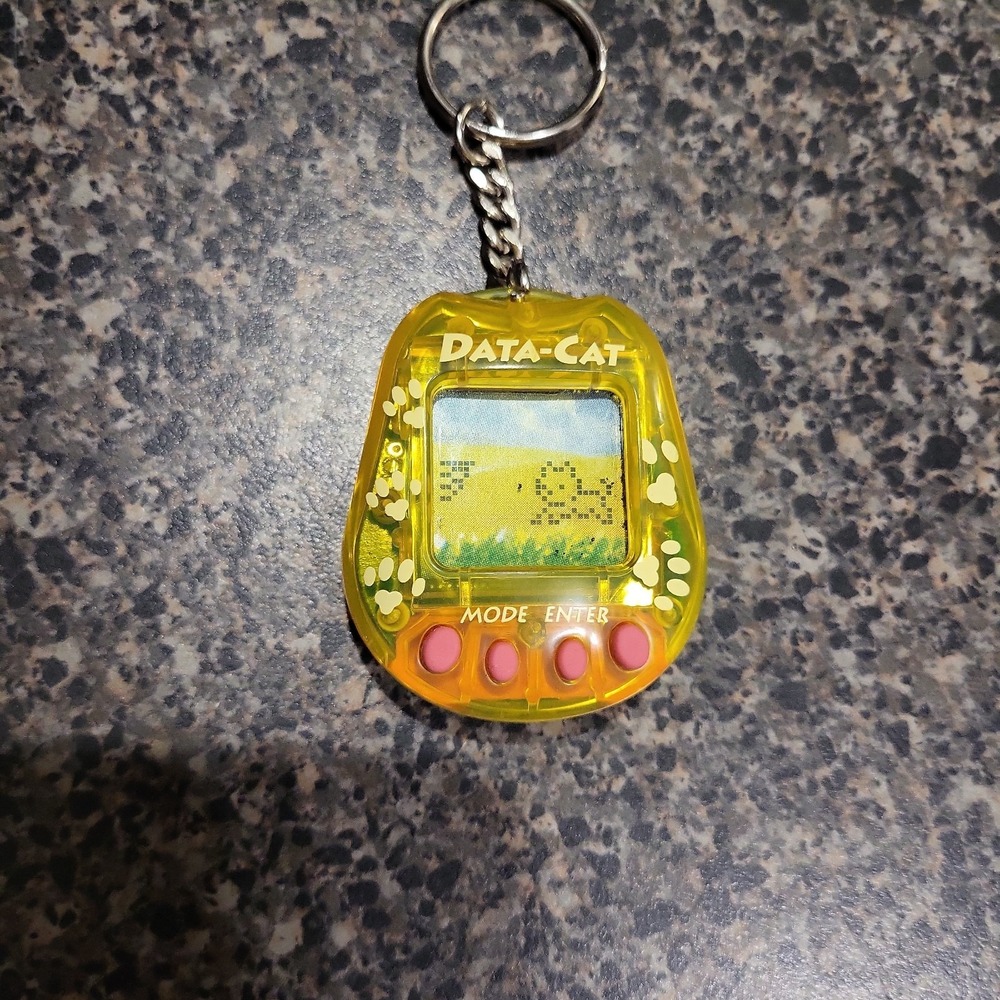 Radio Shack 1997 Data Cat Virtual Pet Tamagotchi Toy Keychain TESTED WORKS